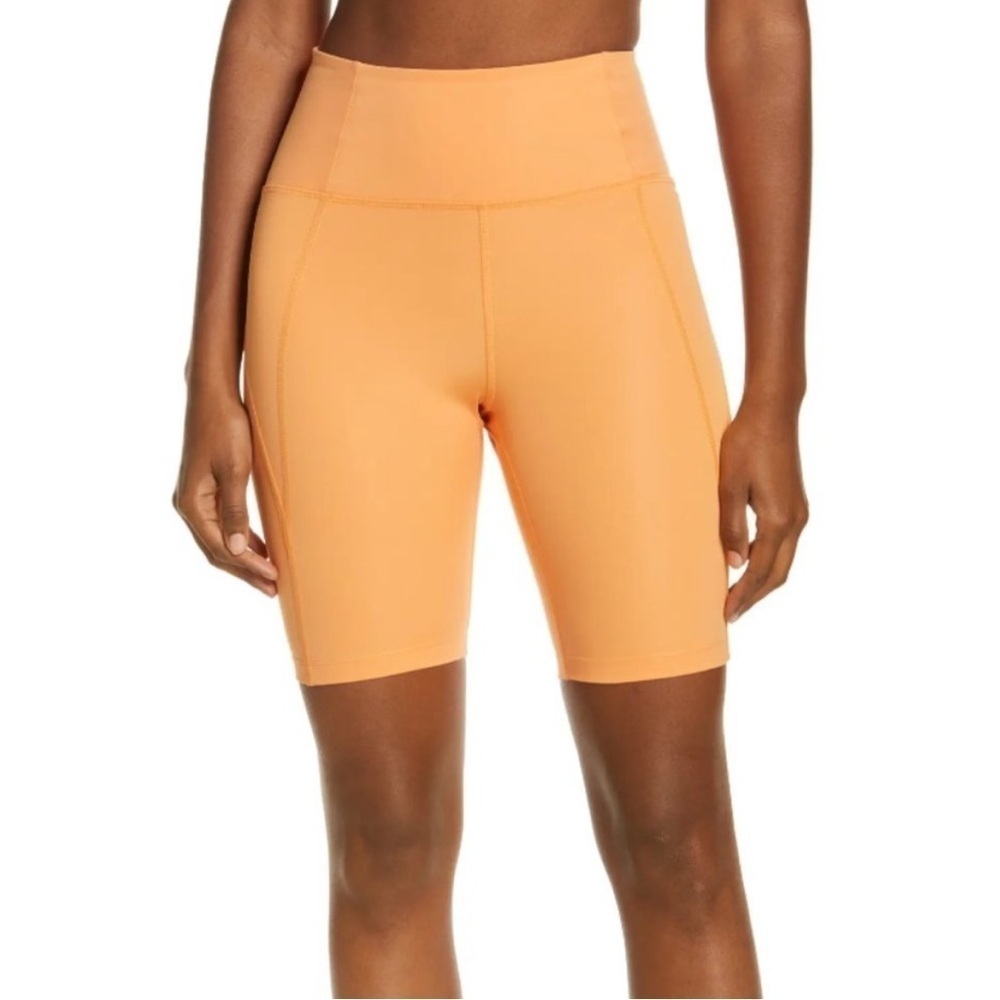 Girlfriend Collective | High Rise Run Bike Shorts Orange Size Medium